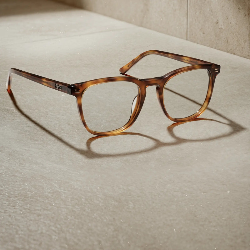 WMP Eyewear Nick prescription eyeglasses in Saddlewood Tortoise, featuring a warm tortoise rounded square frame with clear lenses.