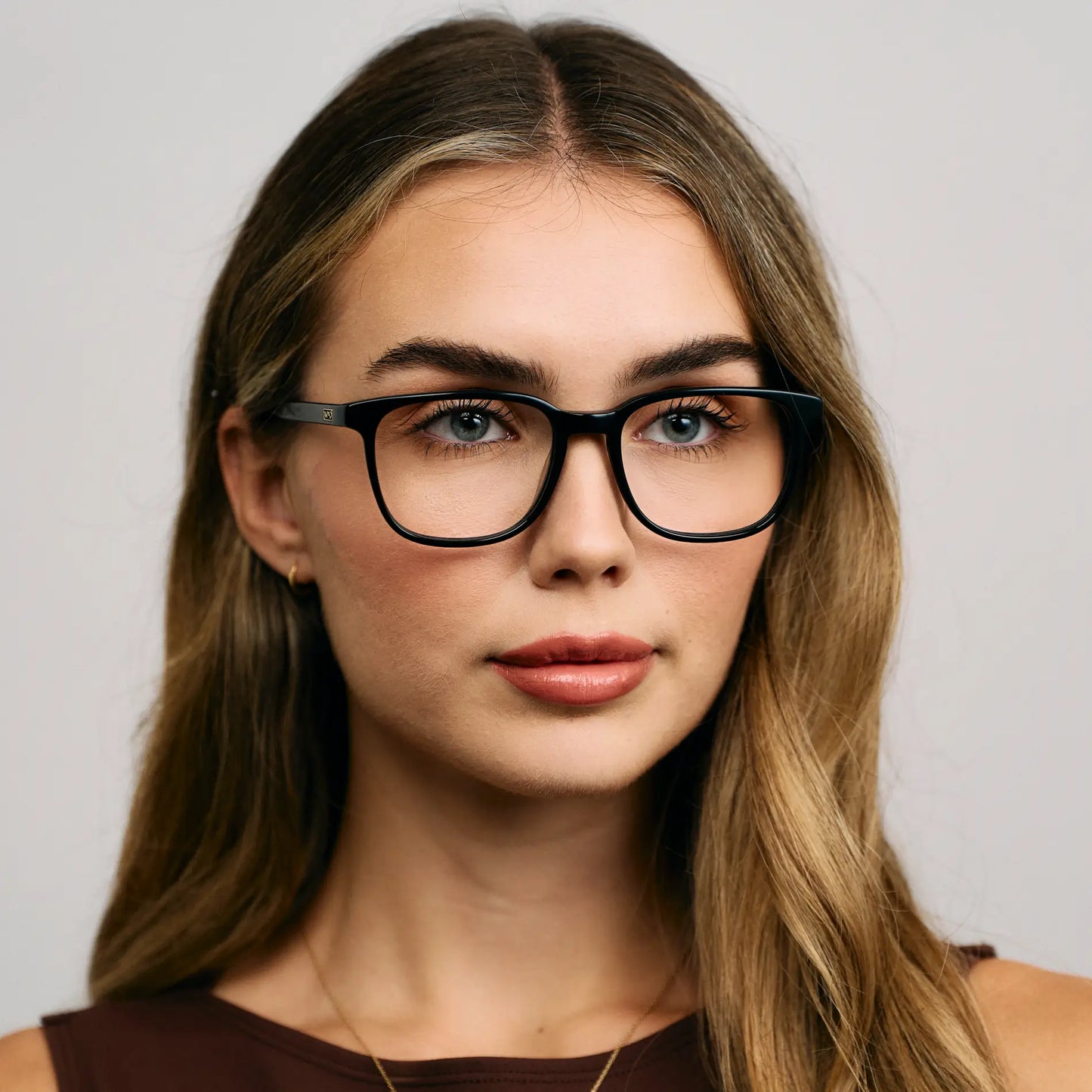 Black || Female Model wearing Unisex Oversized Rectangular Blue Light Blocking Glasses with Black Acetate Frame and Clear Lens