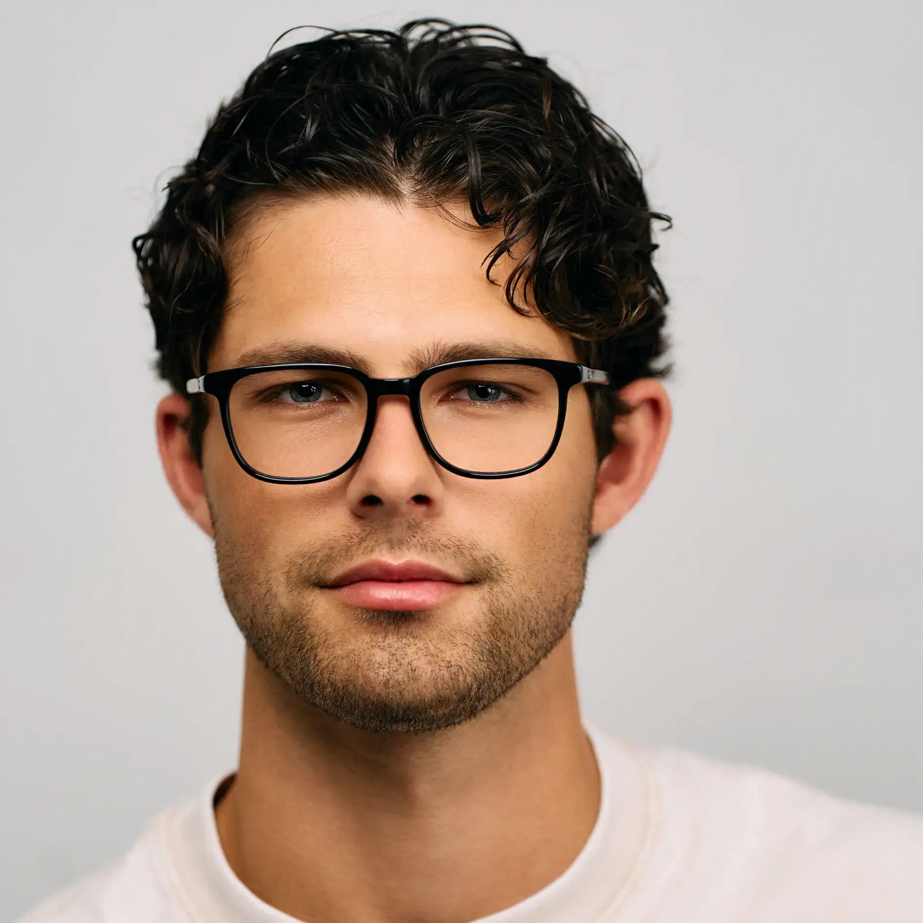 Black || Model wearing Unisex Oversized Rectangular Prescription Eyeglasses with Black Acetate Frame and Clear Lens