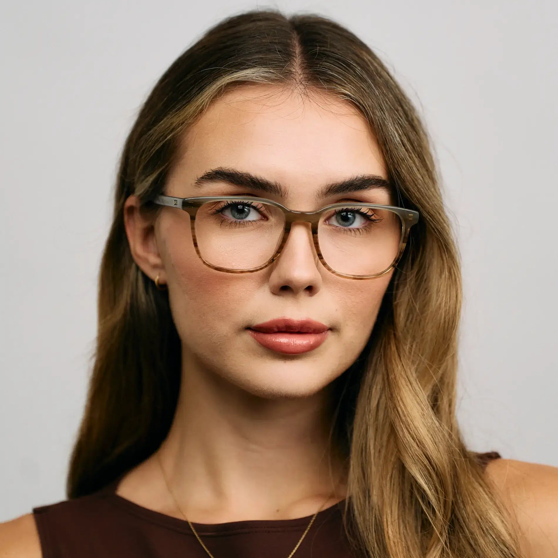 Grey Agate || Model wearing Unisex Oversized Rectangular Prescription Eyeglasses with Grey Agate Acetate Frame and Clear Lens