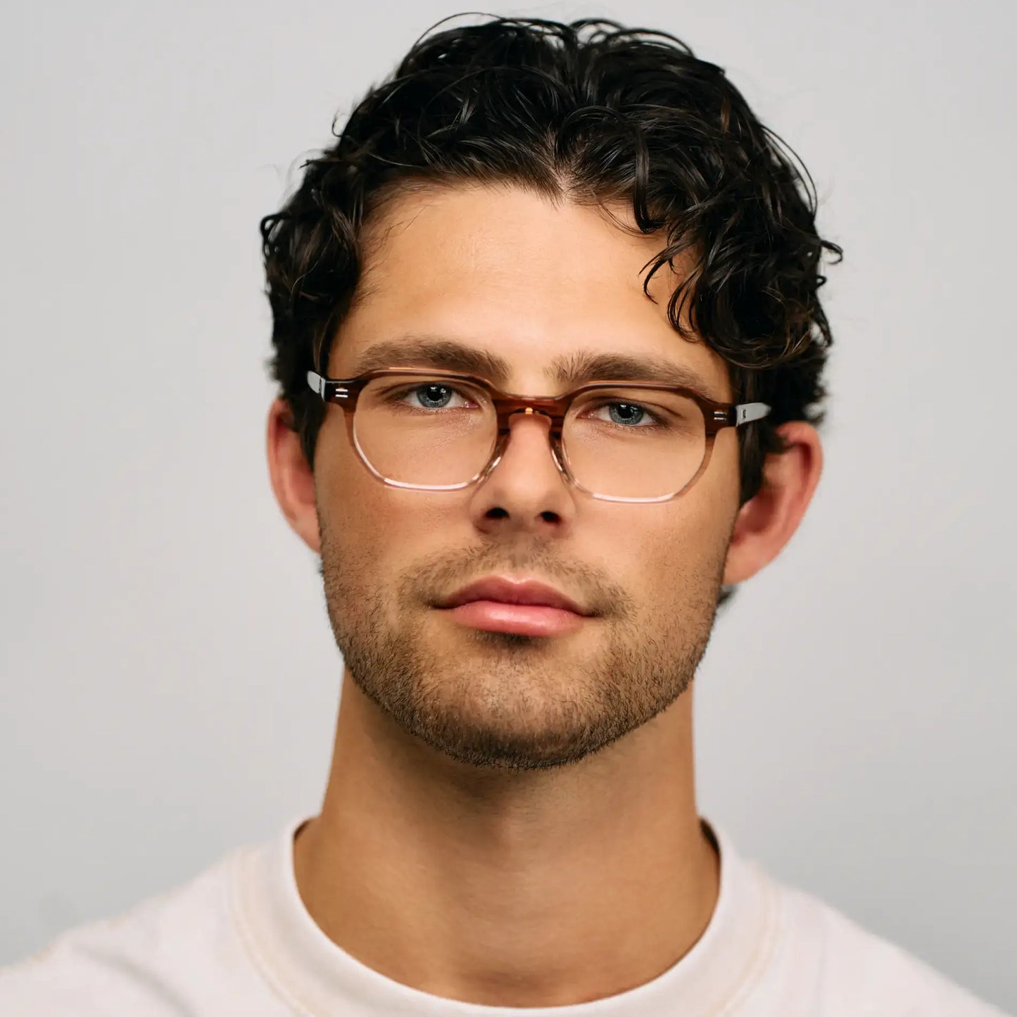 Pale Cedar Brown || Model wearing Unisex Geometric Rectangular Prescription Eyeglasses with Dual-Tone Pale Cedar Brown Acetate Frame and Clear Lens