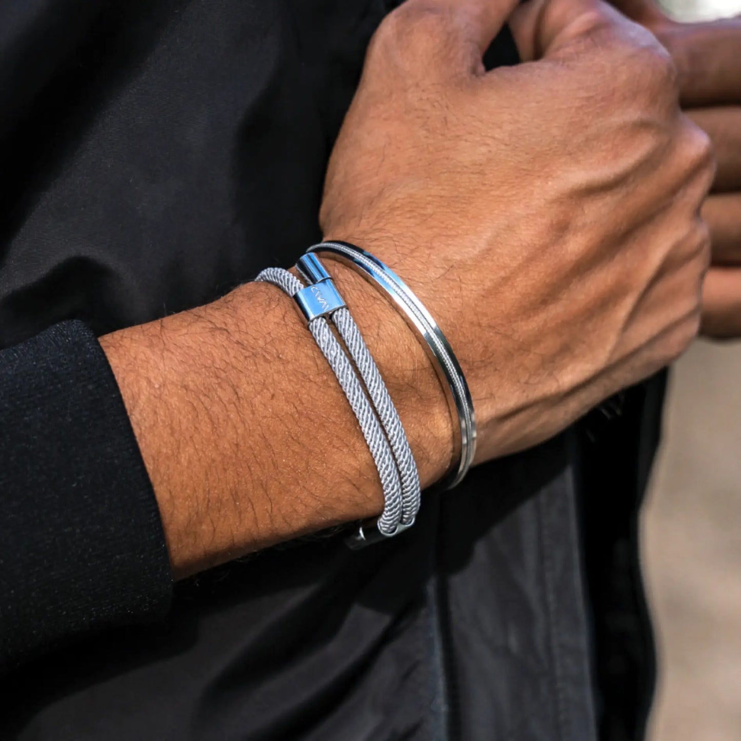 Stone Grey / Silver || Stone grey braided rope bracelet with polished silver clasp paired with slim silver bangle on wrist