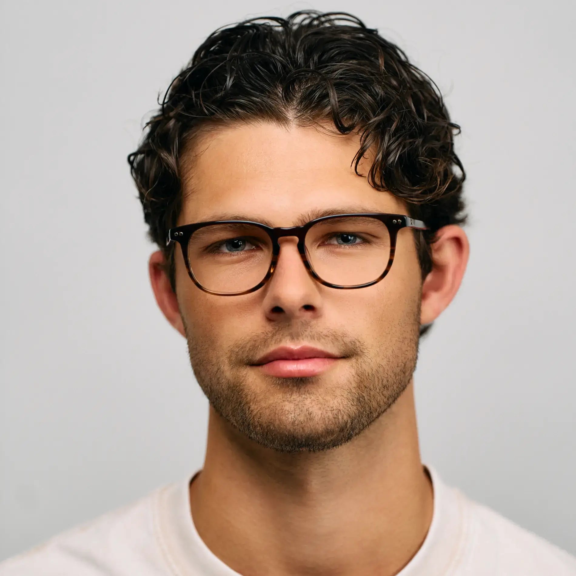 Rye Brown || Model wearing Men's Rectangular Prescription Eyeglasses with Rye Brown Acetate Frame and Clear Lens