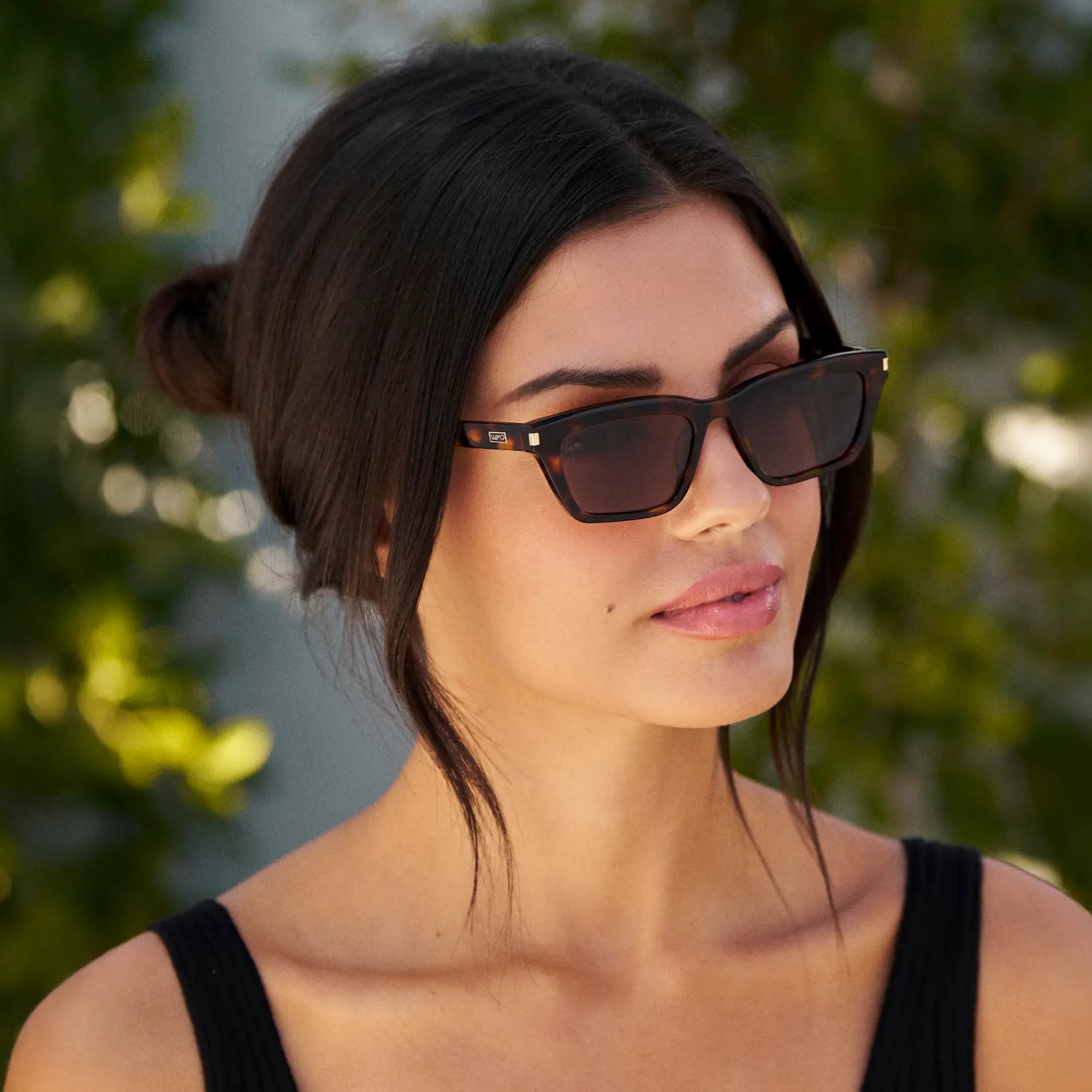 Brown Tortoise / Brown Lens || Model wearing Women's Cat Eye Polarized Sunglasses with Brown Tortoise Frame and Brown Lenses