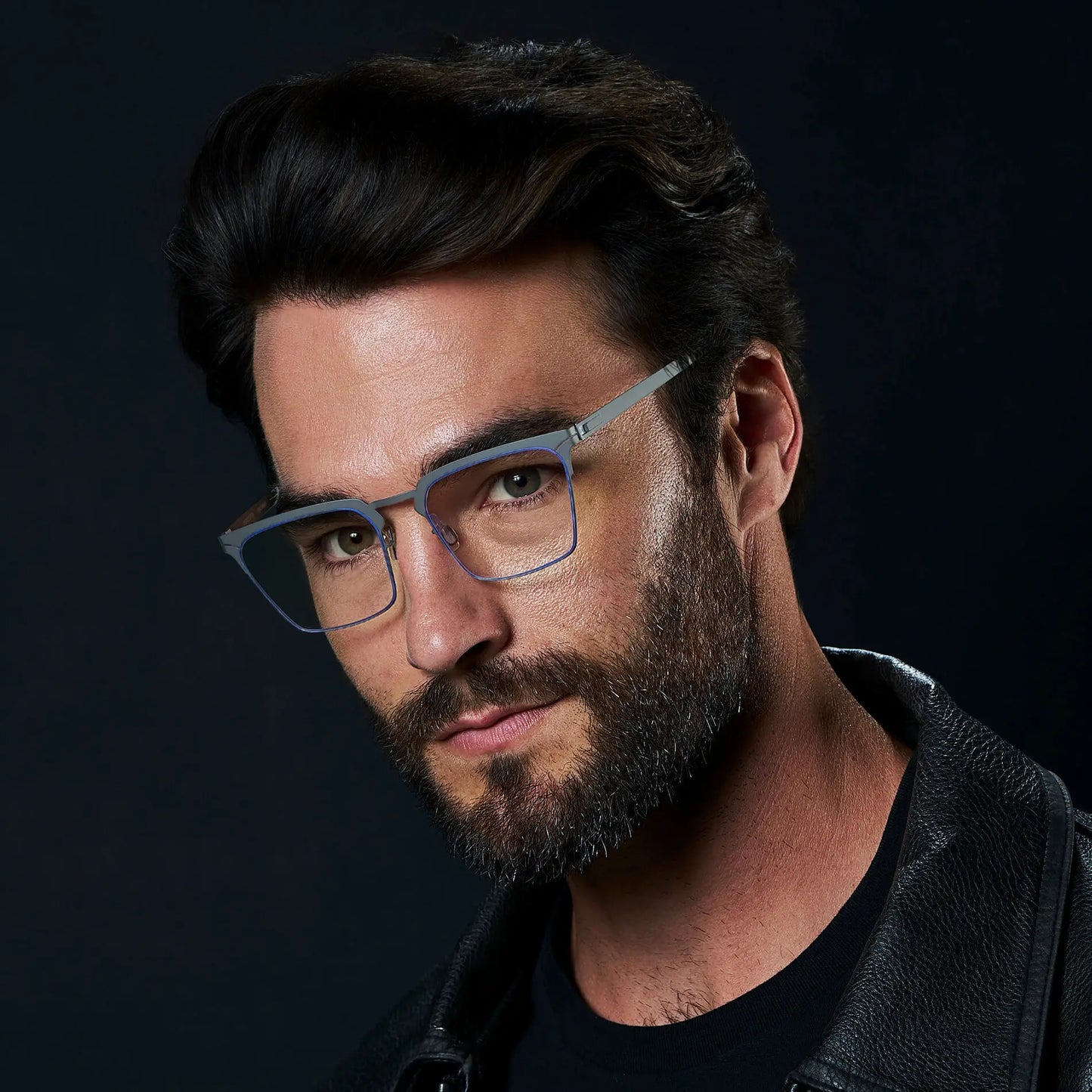 Matte Grey || Raven blue light glasses with a thin rim frame matte grey frame and rectangular clear lenses worn by man