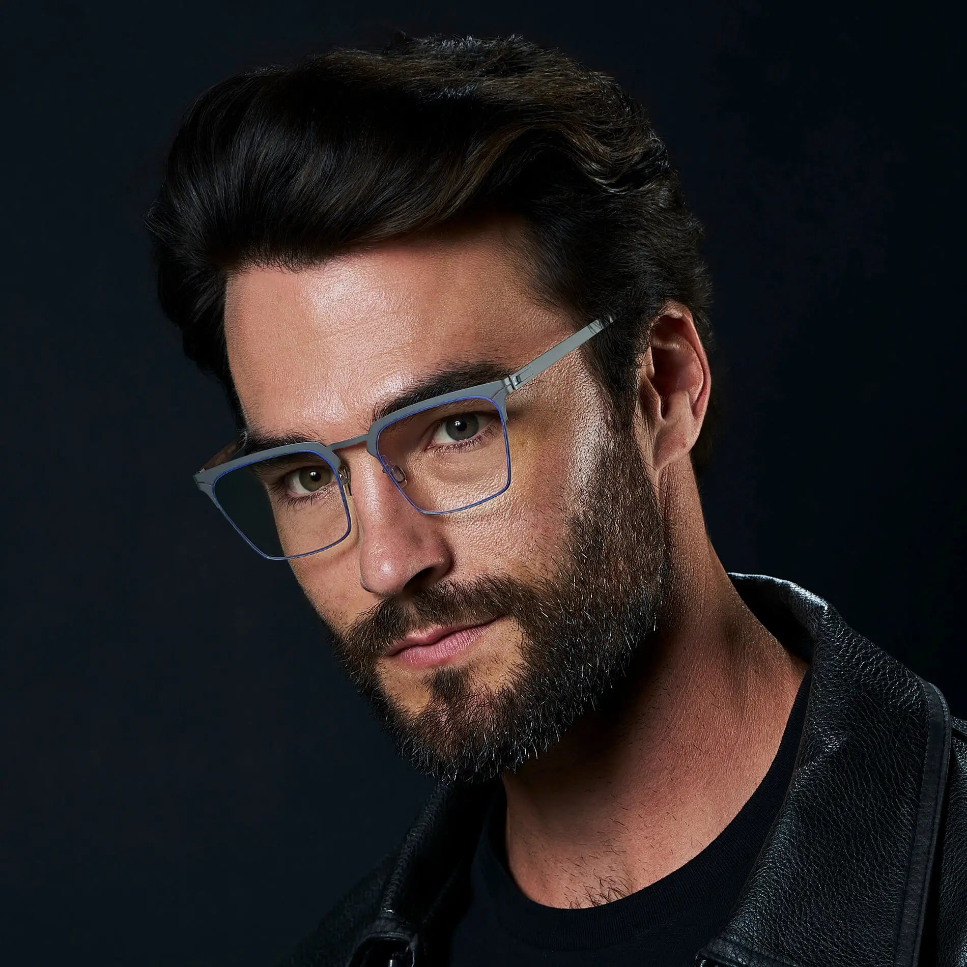 Matte Grey || Raven blue light glasses with a thin rim frame matte grey frame and rectangular clear lenses worn by man