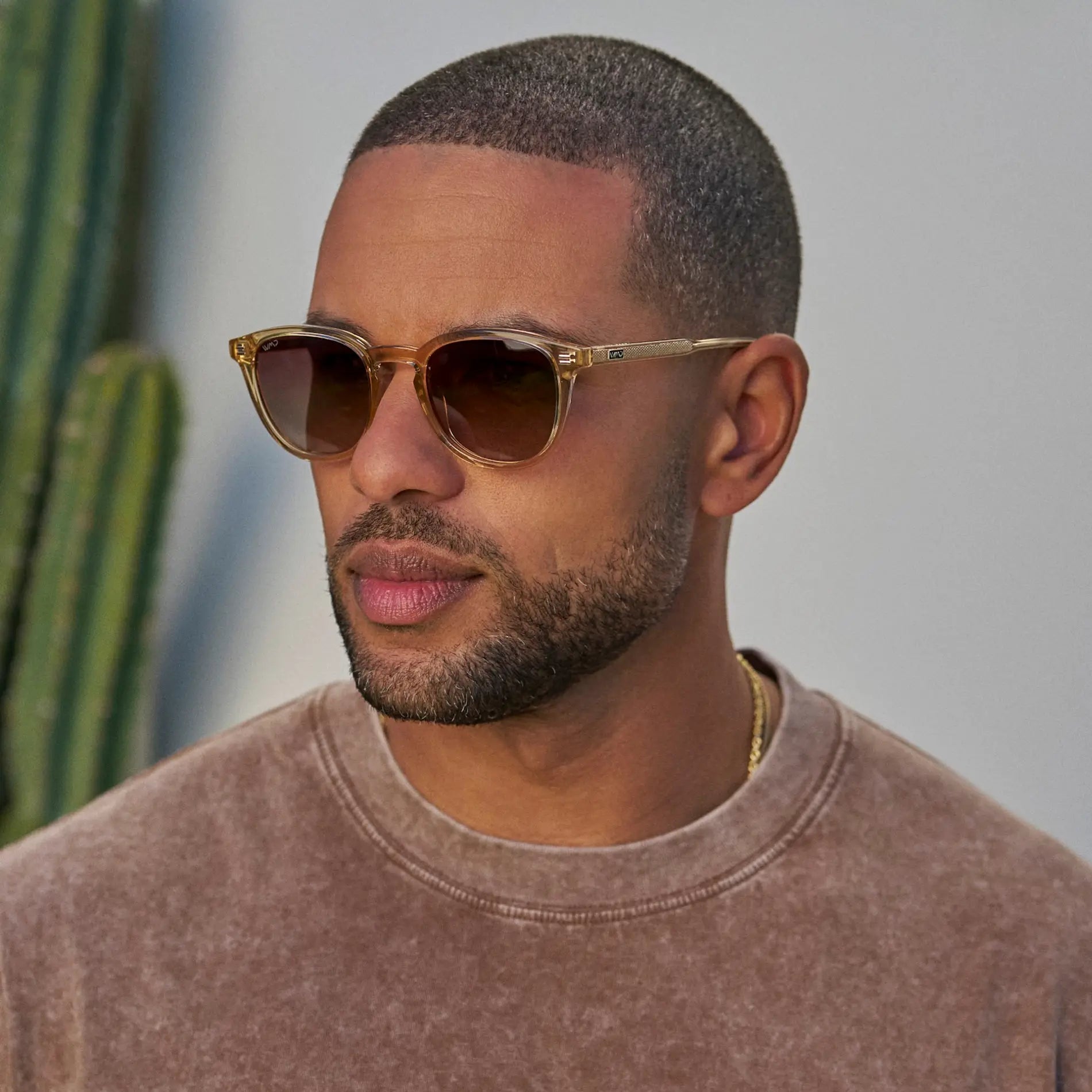 Sand Brown / Brown Gold Gradient Lens || Model wearing Men's Rounded Oval Polarized Sunglasses with Sand Brown Acetate Frame and Brown Gold Gradient Lens