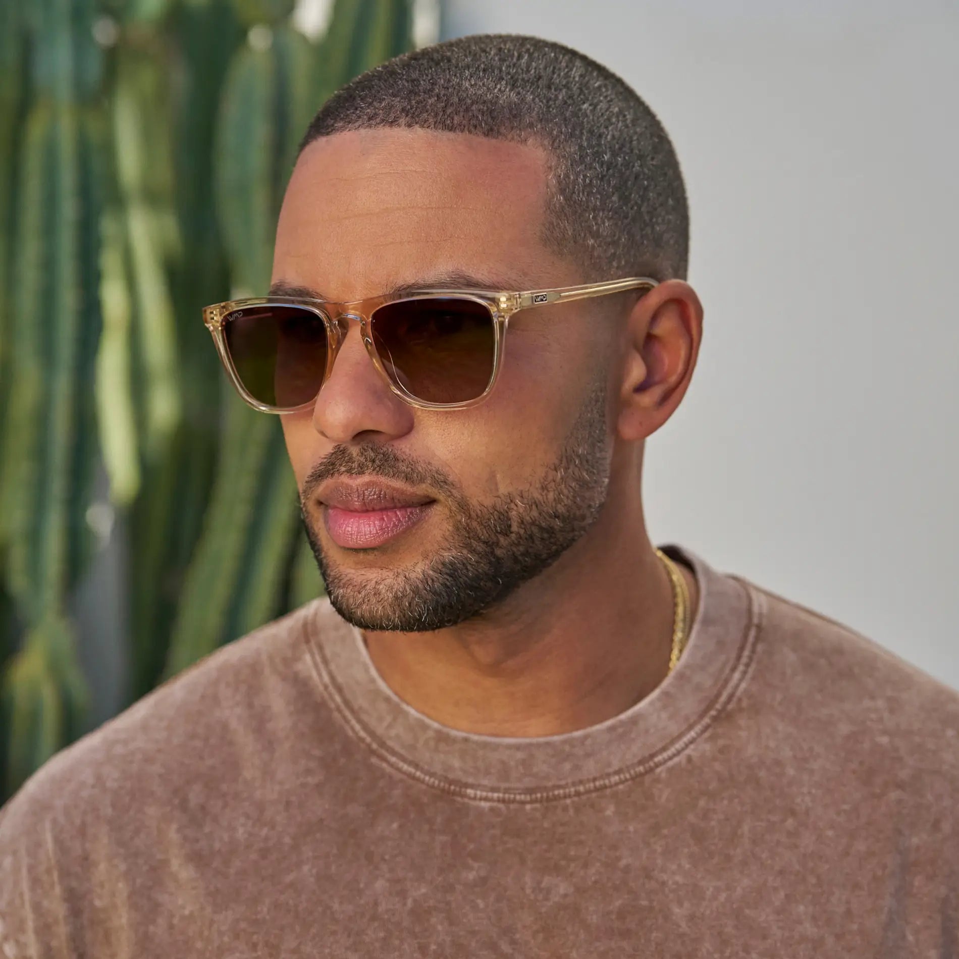 Sand Brown / Brown Gold Gradient Lens || Model wearing Men's Sand Brown Classic Square Frame Sunglasses with Brown Gold Gradient Polarized Lenses
